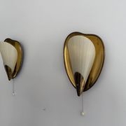 Pair of brass and glass wall lights from the mid-century, 1950s, Germany.