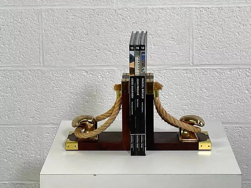 Pair of antique wooden and brass bookends