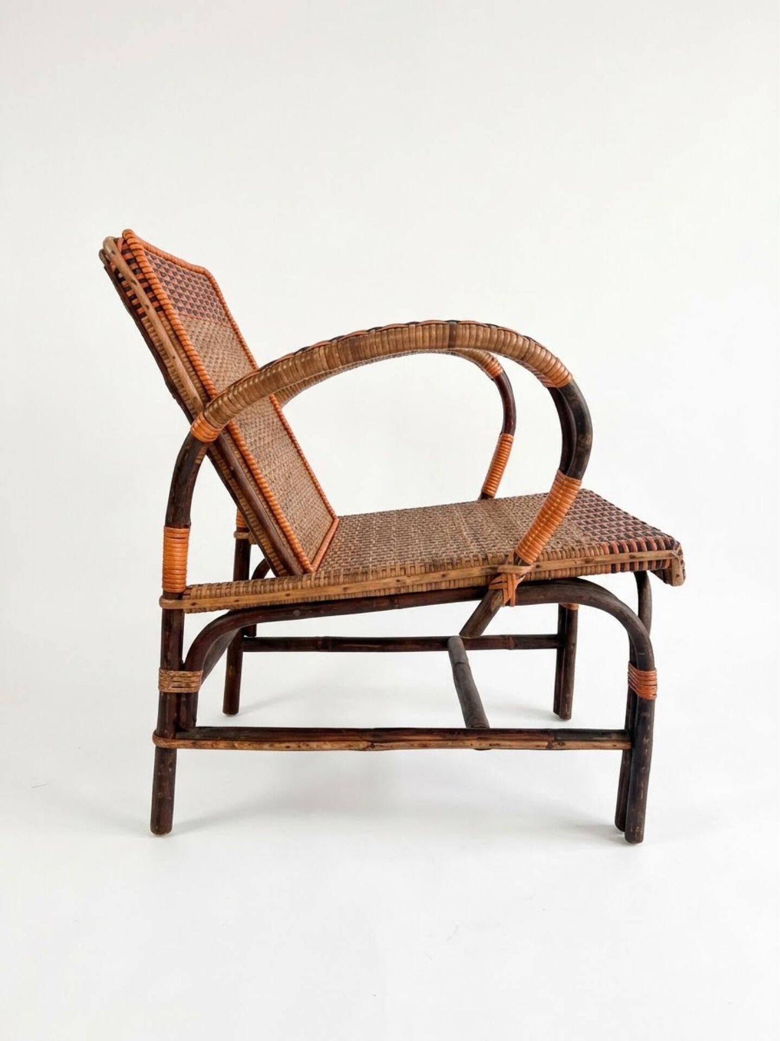 Vintage low armchair in rattan & two-tone weaving 1960s