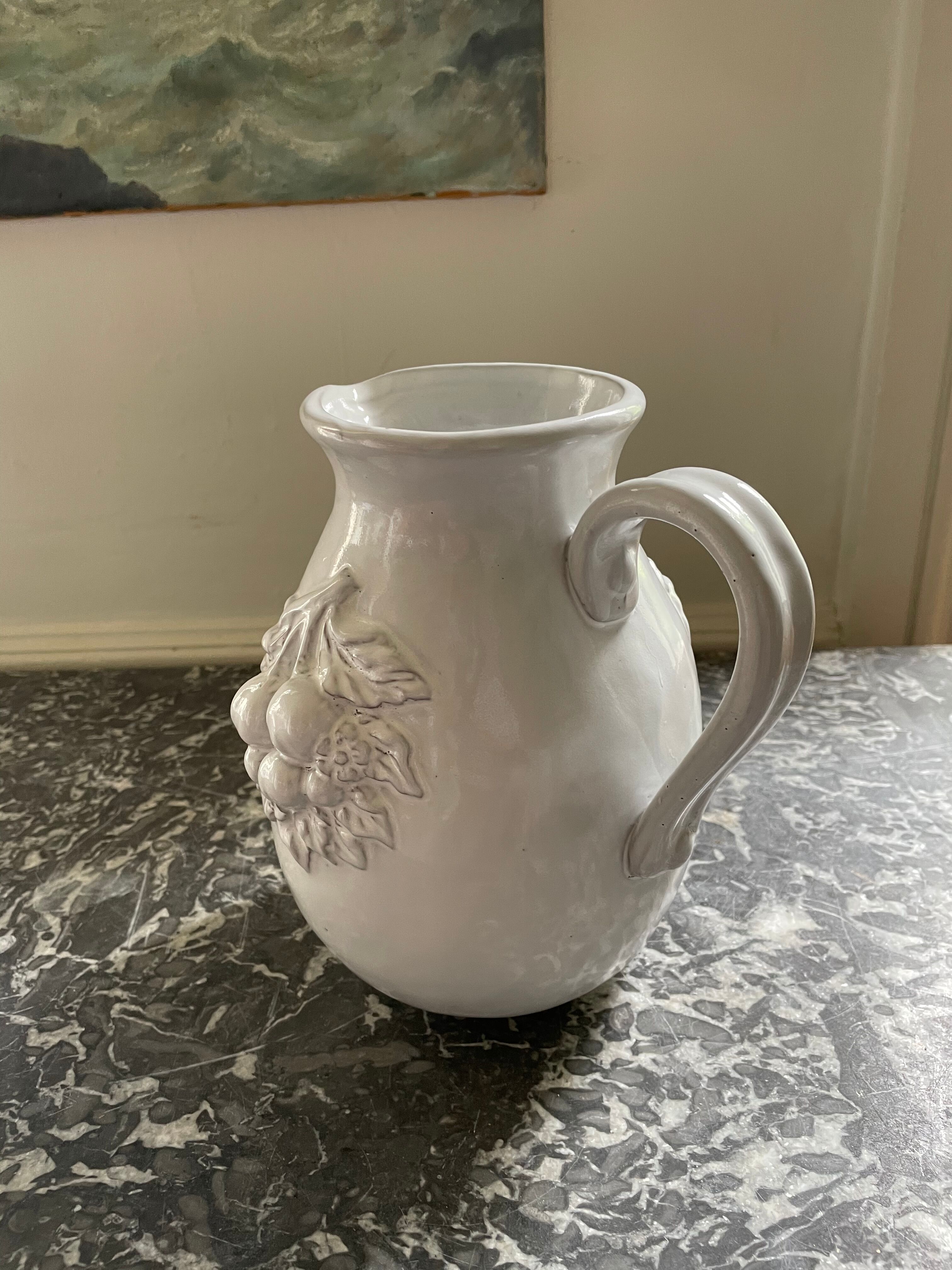 Pitcher in dabbling cherry decoration