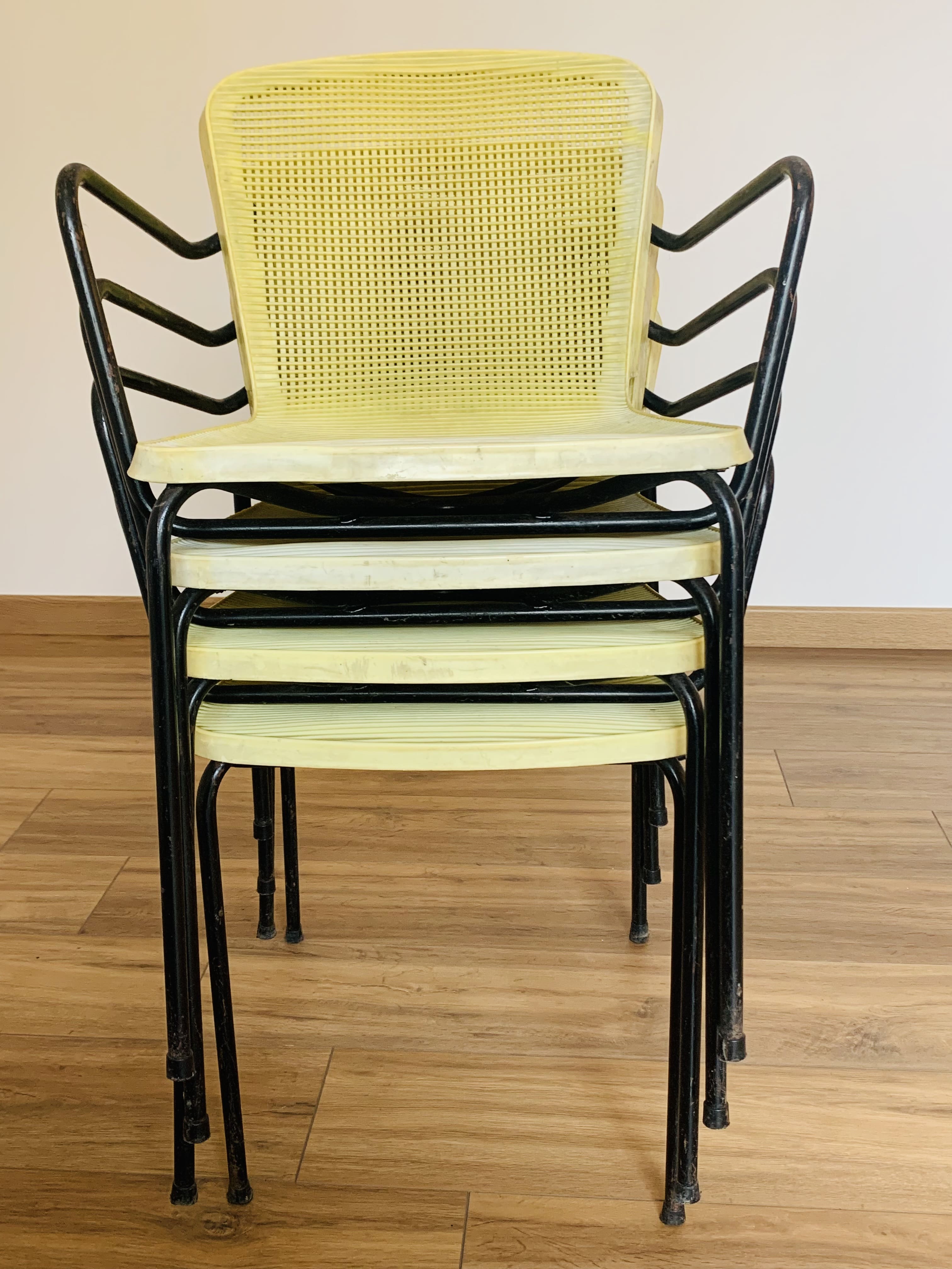 4 yellow outdoor armchairs