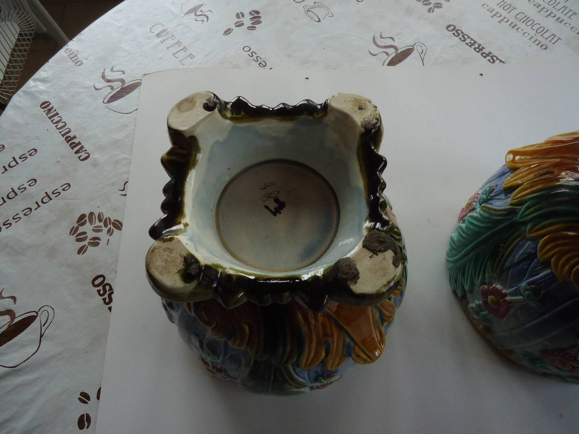 Pair of antique ceramic pot covers