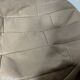 Pair of De Sède patchwork leather poufs