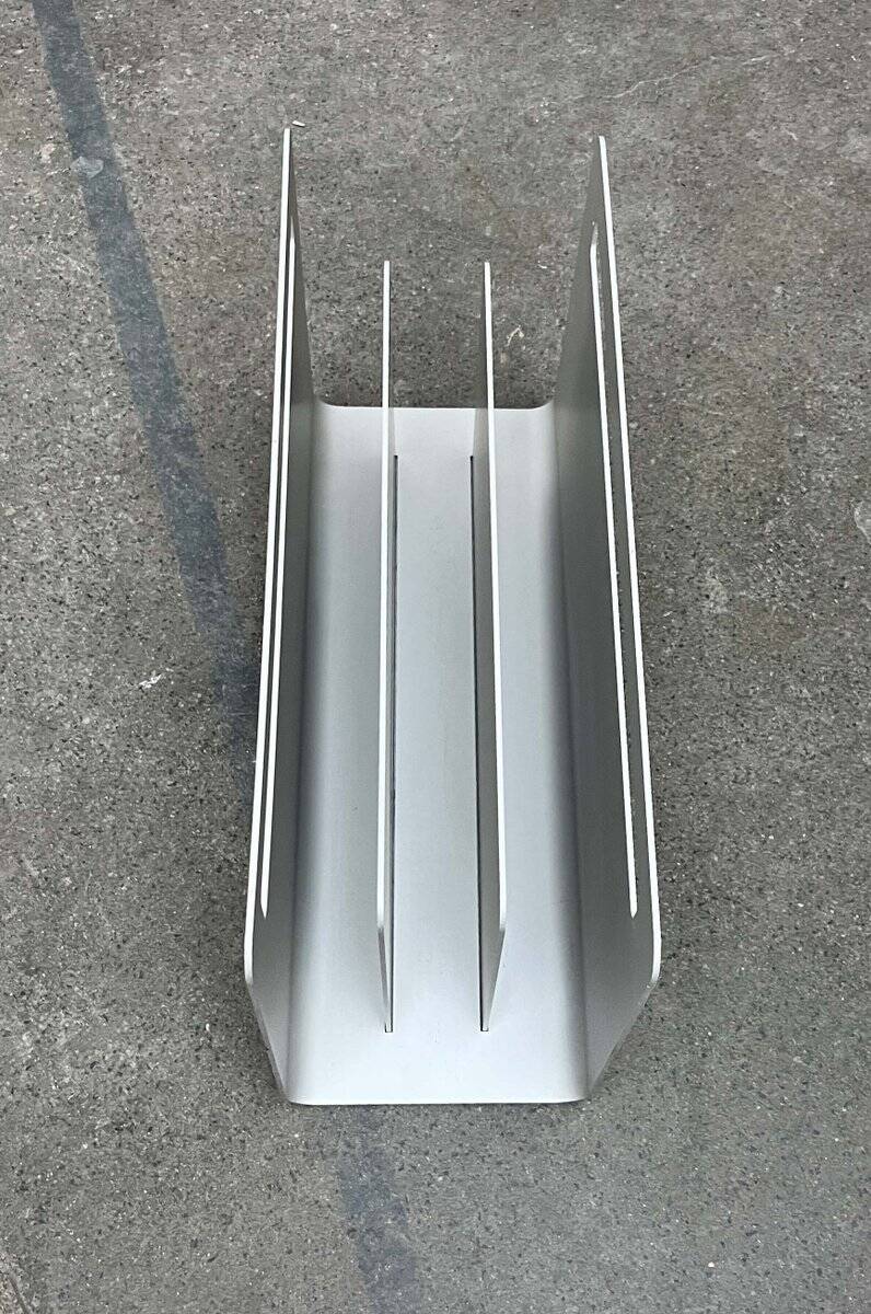 Minimalist aluminium magazine rack by Norman Foster for Helit, Germany, 1990s.