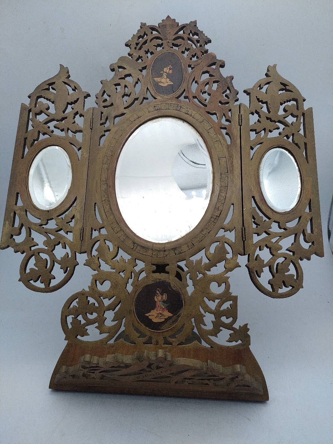 Ancient triptych in olive wood. Italy.