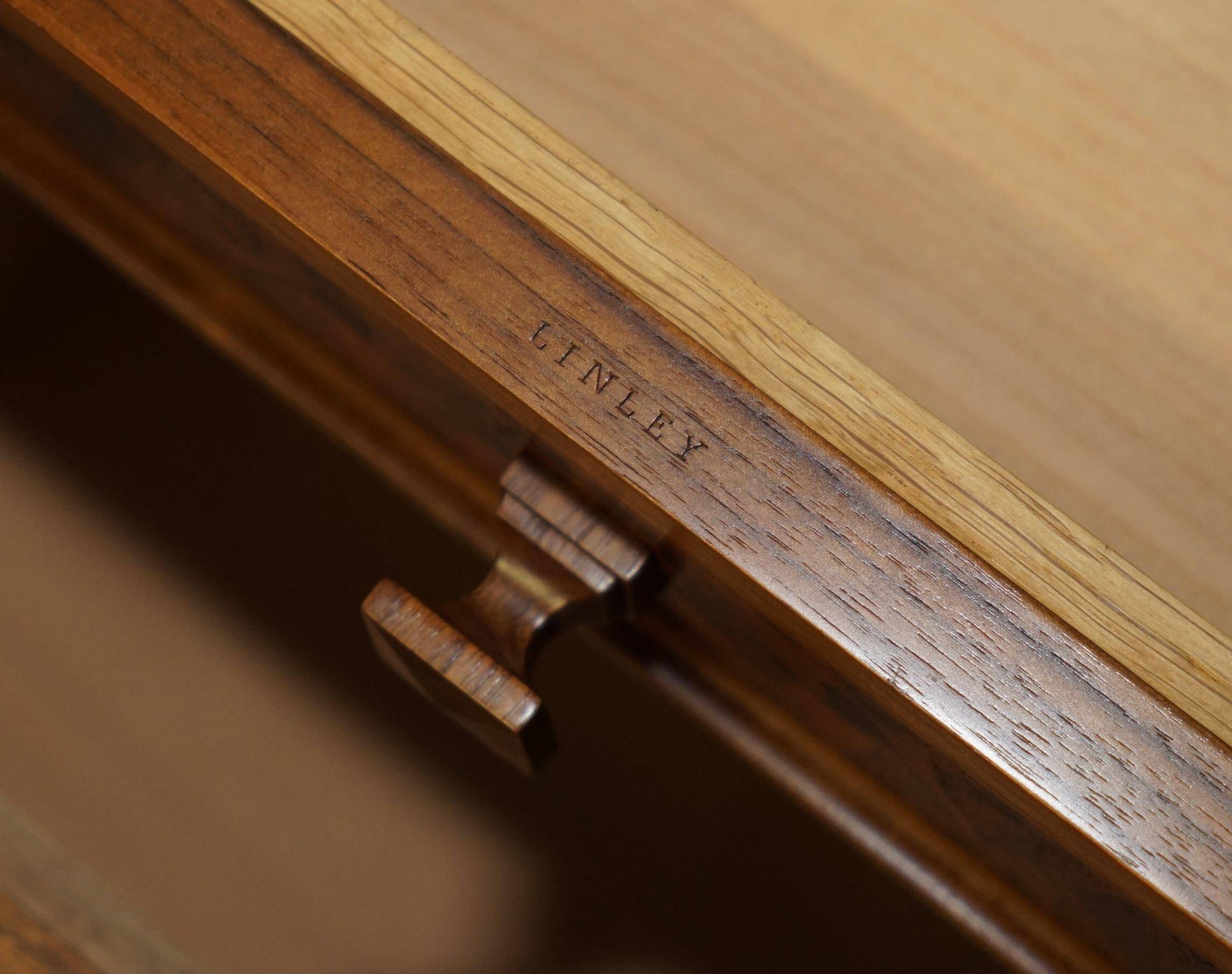 David Linley Burr walnut chest of drawers for light restoration.