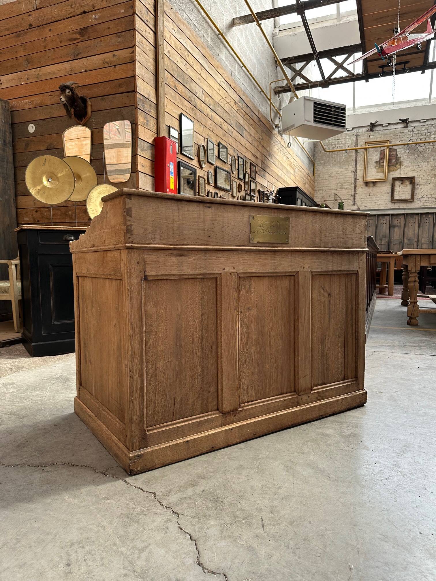 Solid oak reception desk, early 20th century