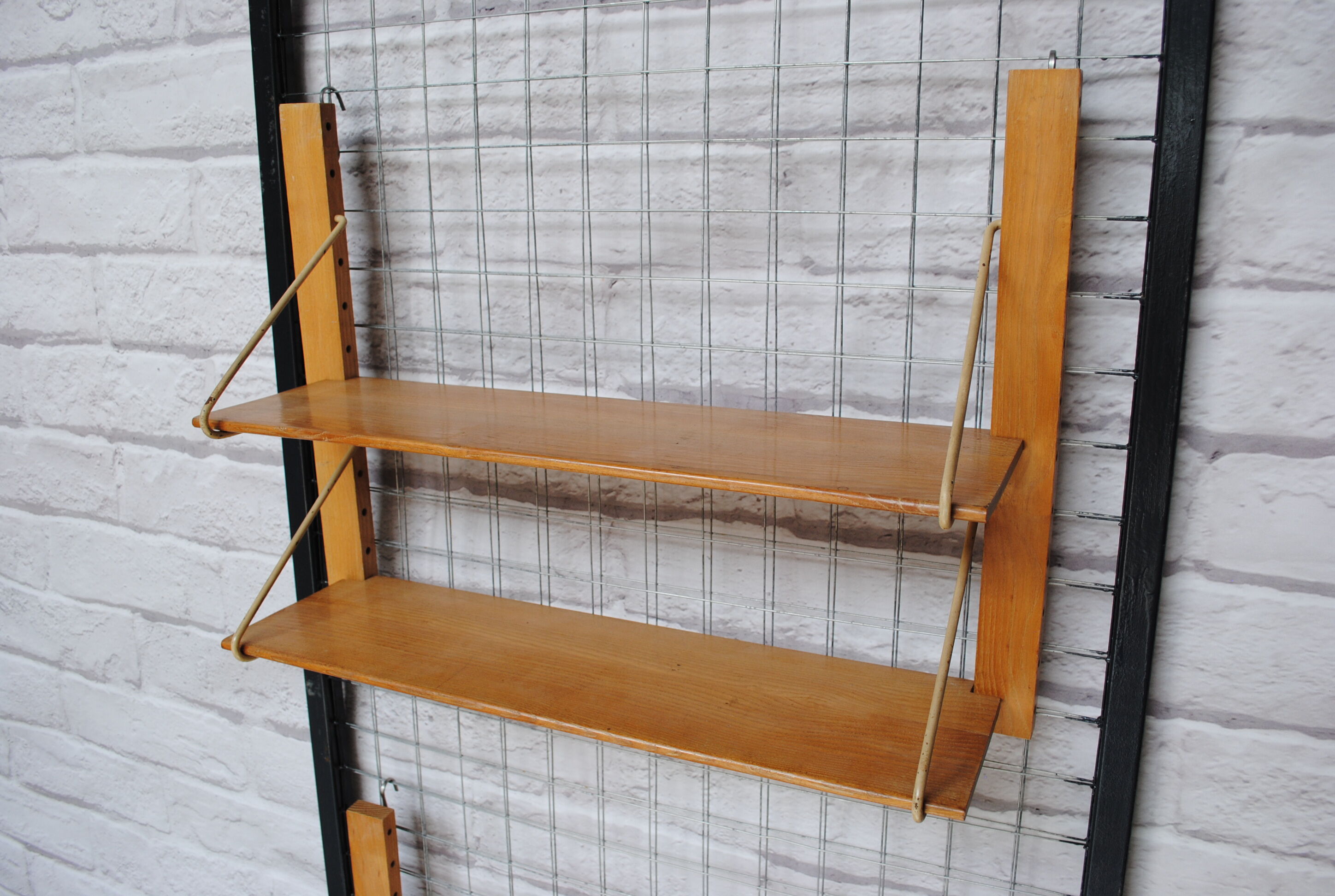 Wooden and metal wall shelf