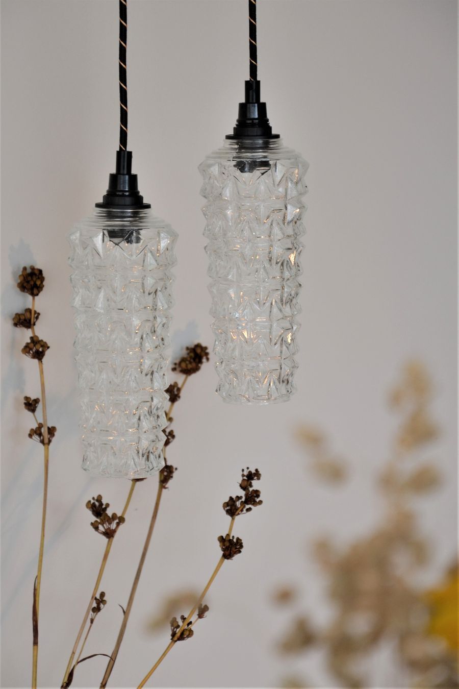 Pair of high-rise suspensions in chiseled glass - spindle shape of the 50s 60's -