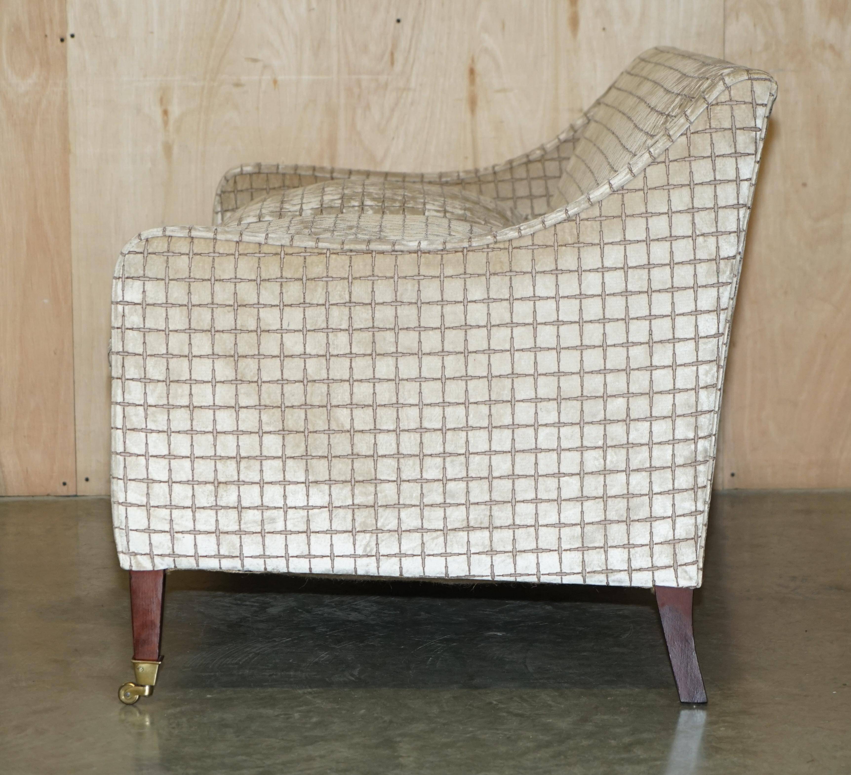 Fabric sofa and footstool, handmade in England.