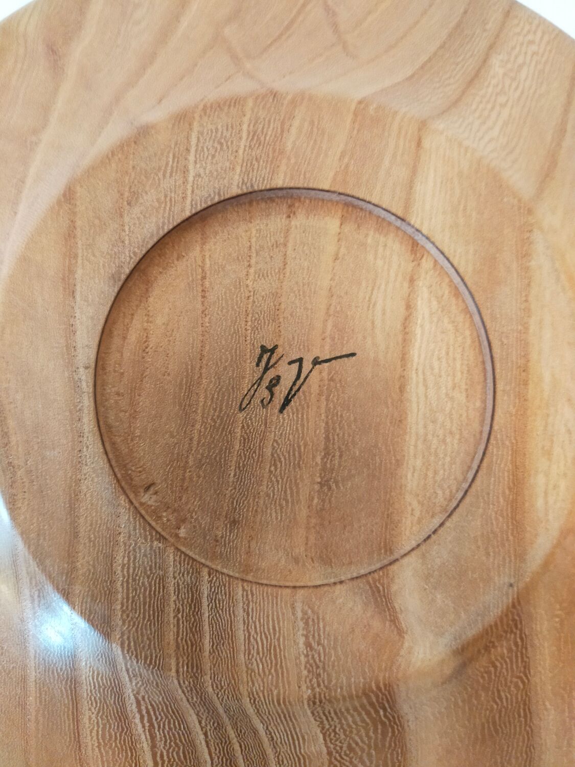 Empty turned wooden pocket