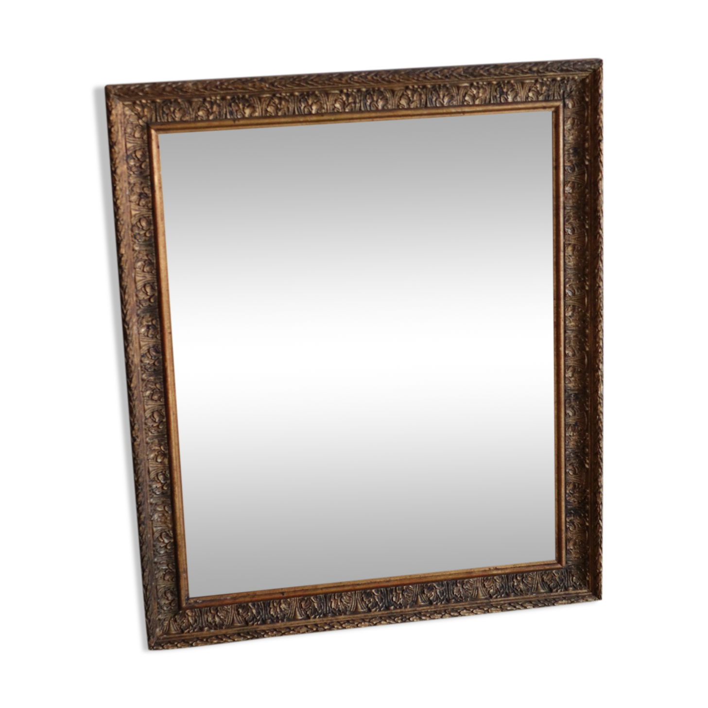 Antique mirror in wood and stucco