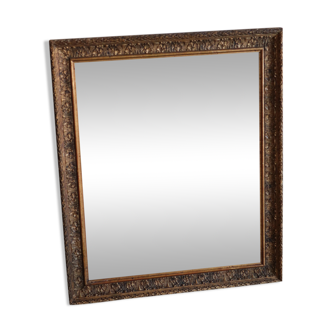 Antique mirror in wood and stucco