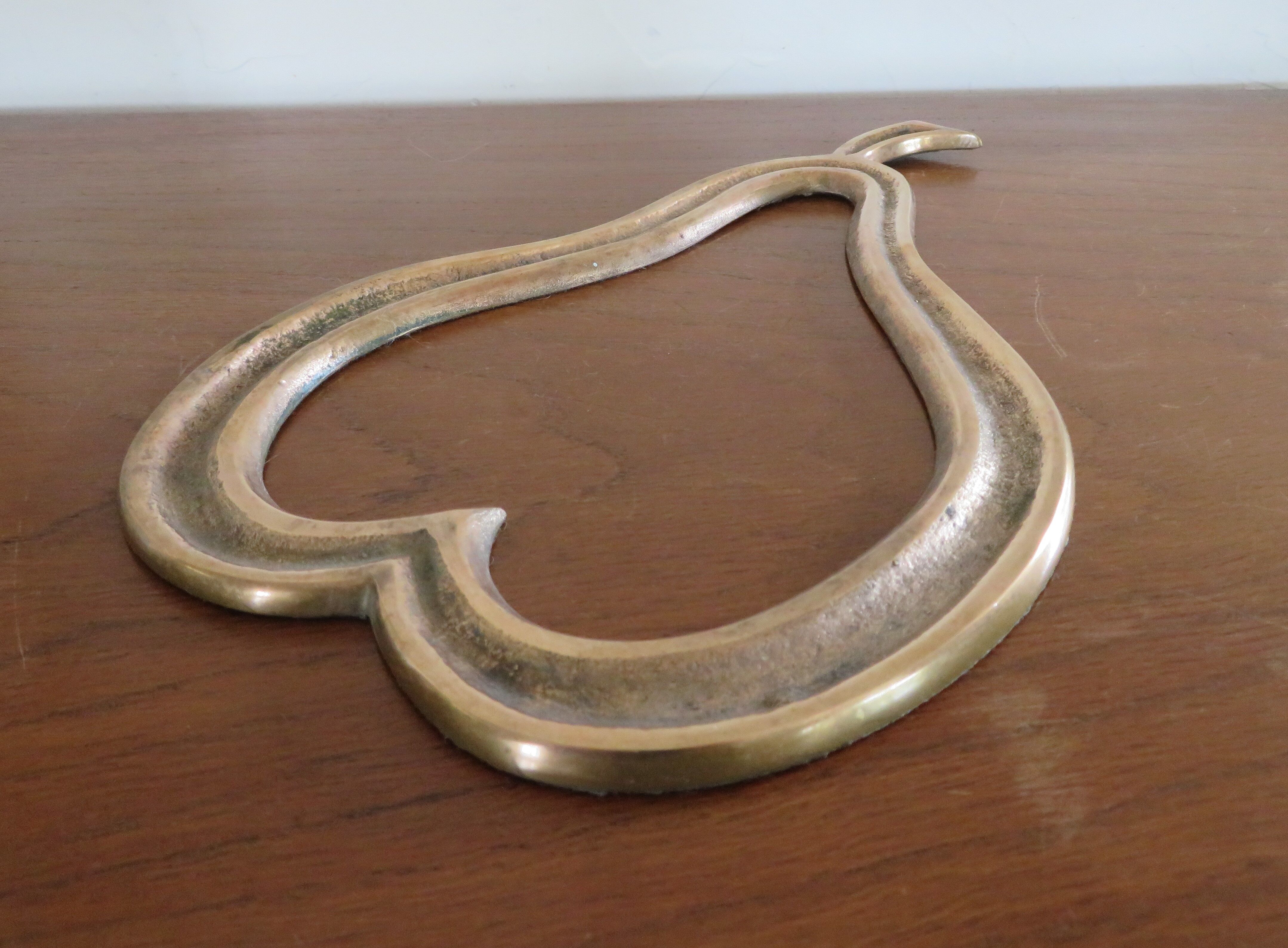 Brass pear mat