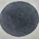 Tisca black round rug with a diameter of 2m.