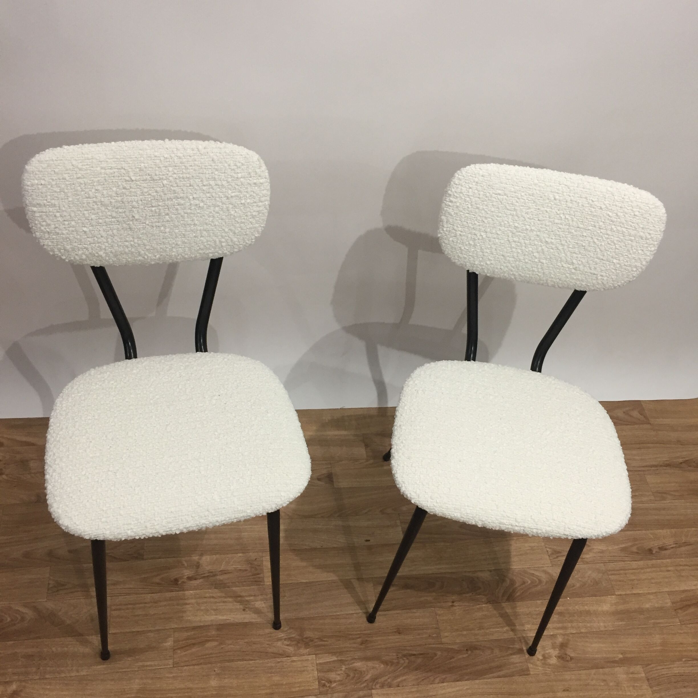 pair of reupholstered chairs loop