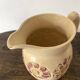 Flower-patterned earthenware pitcher