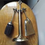 Small and discreet brass fireplace tool set.