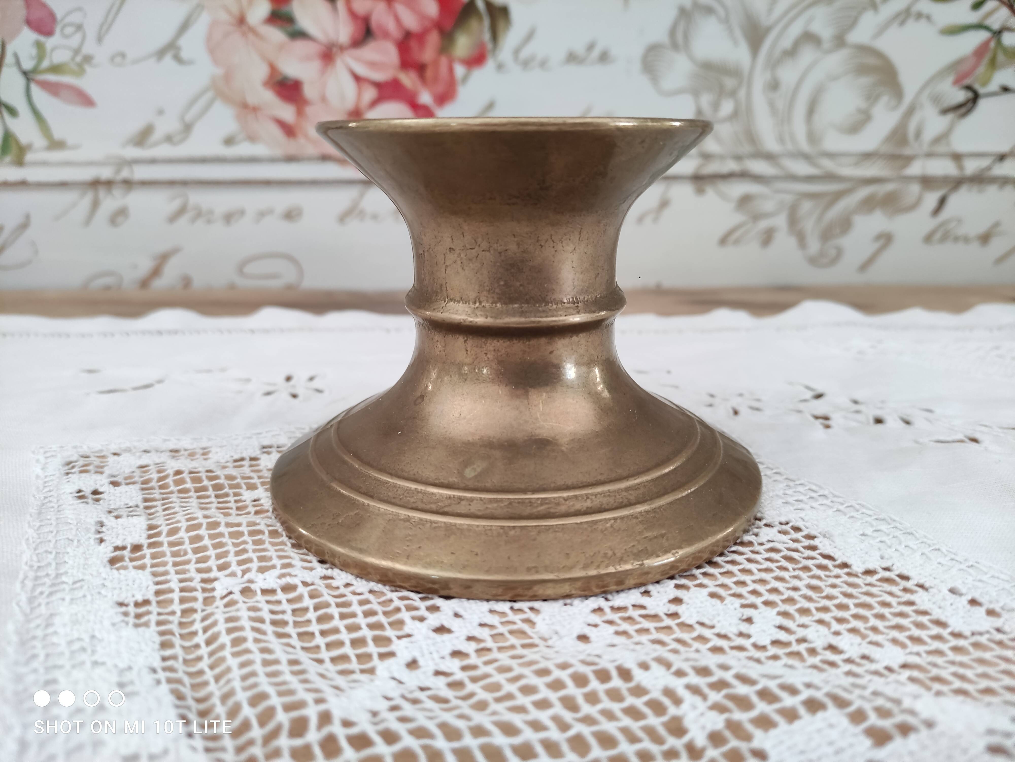 Low brass candle holder