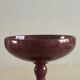 Candlesticks and bowl in speckled ceramic.