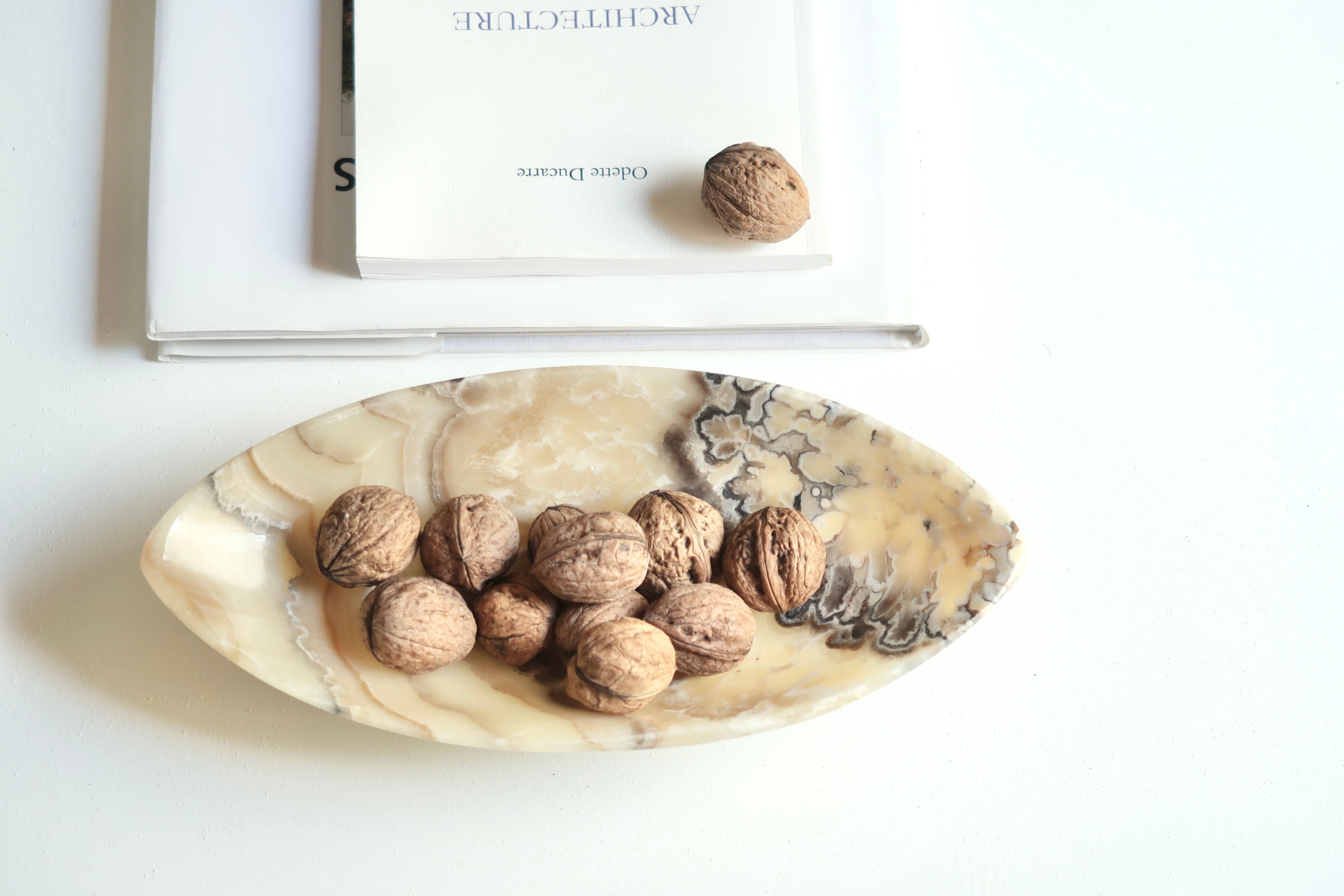 Mexican tidy in carved stone, 70s