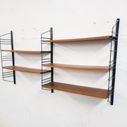 Mid-century book shelves in the style of Tomado