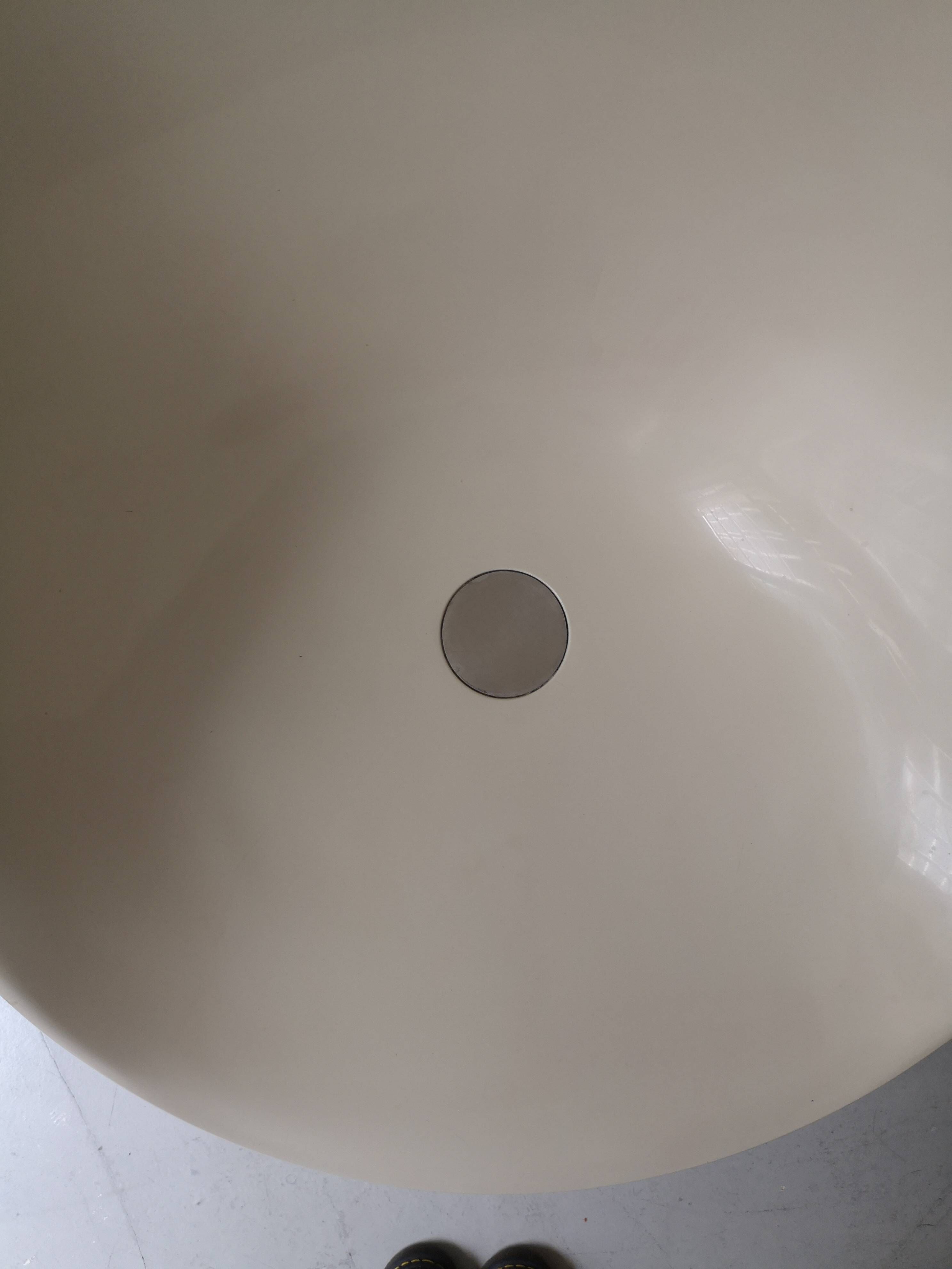 Ero swivel armchair in metal and white shell, p. starck design for kartell