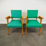 Pair of wood and vinyl armchairs