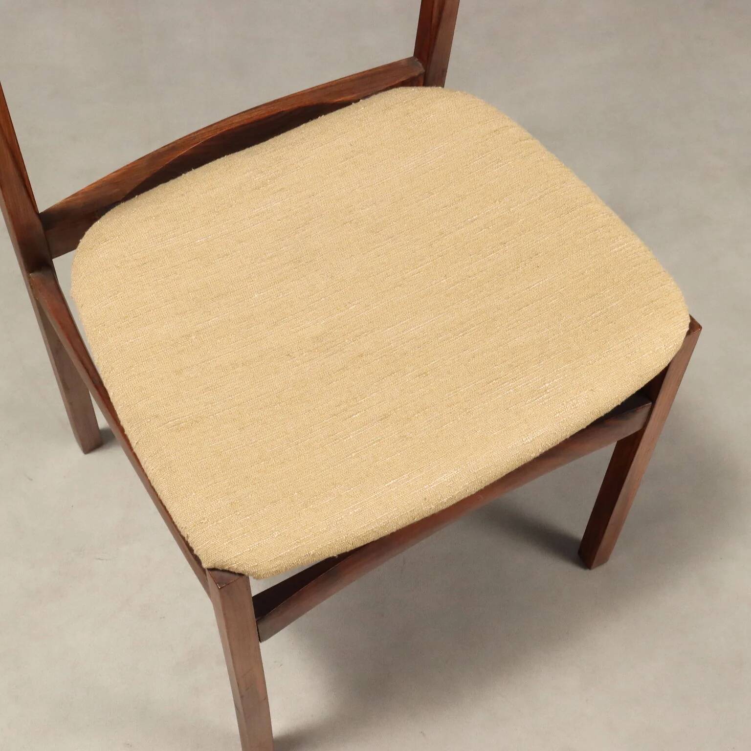 Vintage lounge chairs in exotic wood and fabric, 1960s design.