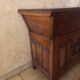 Old solid wood dough mixer carefully transformed into a bar cabinet.