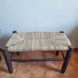 Moroccan bench in dark wood with woven palm leaf seat