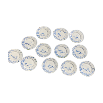 Set of 12 flat plates gien hunting scene