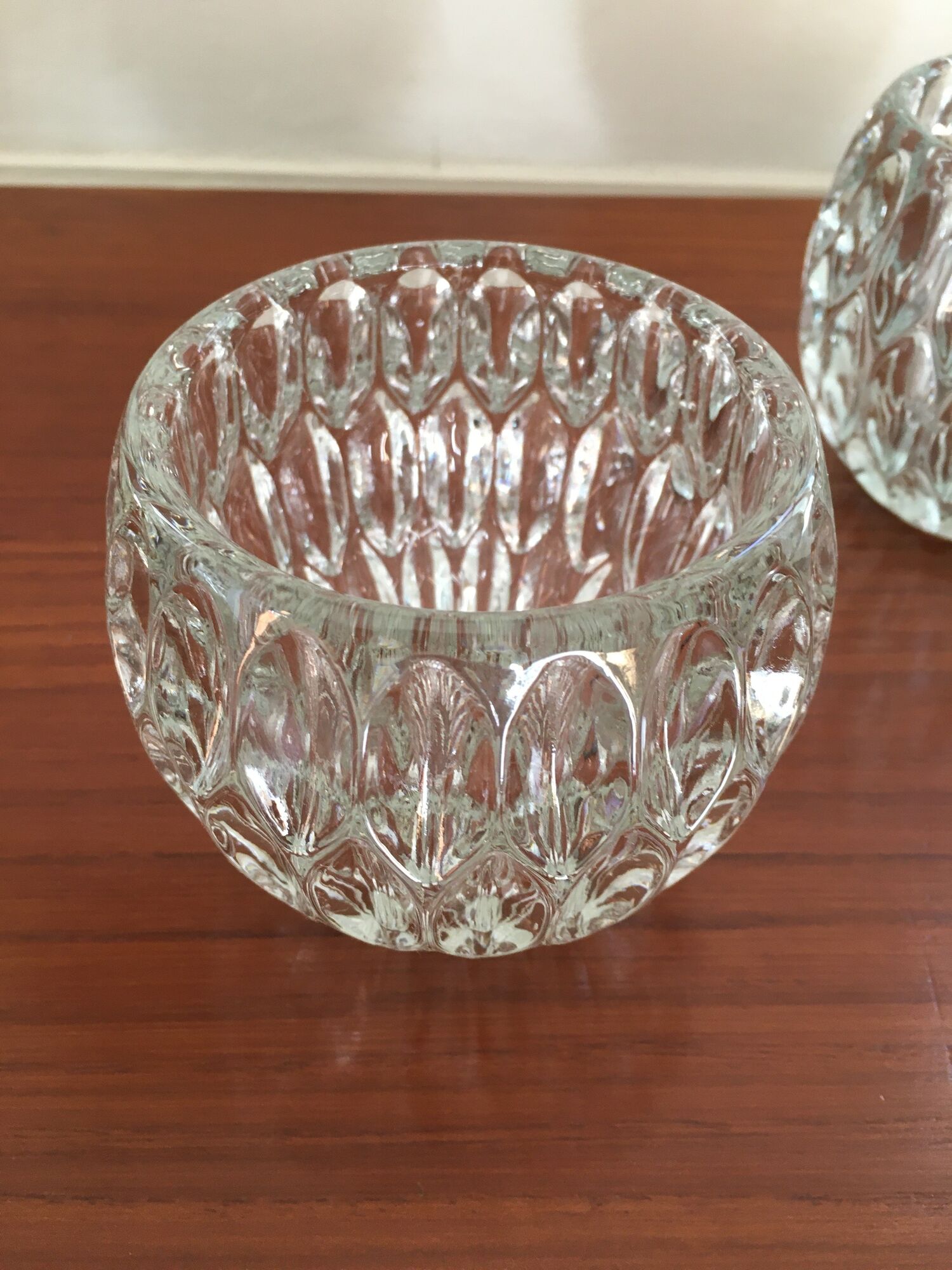 Duo of chiseled glass photophores