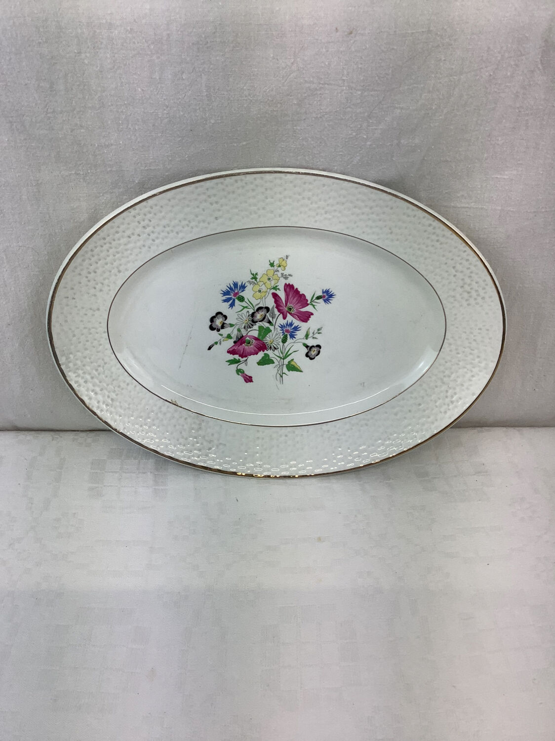 Old artisanal dish made in France Digoin
