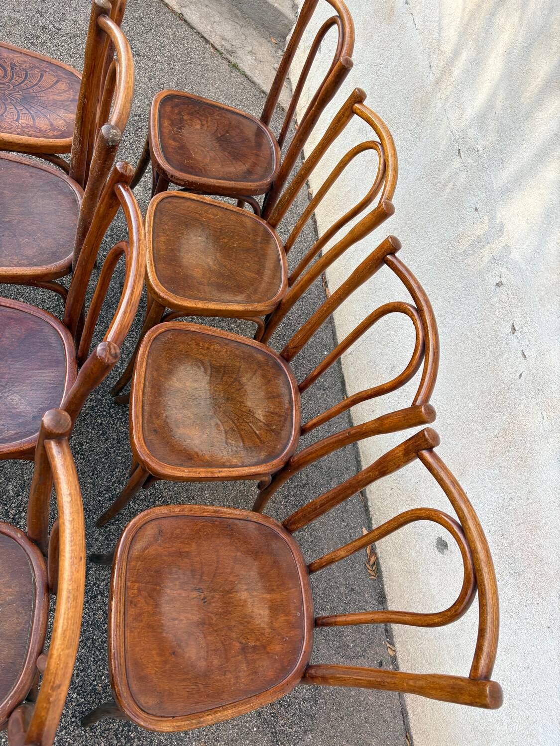 10 varnished patterned bistro chairs