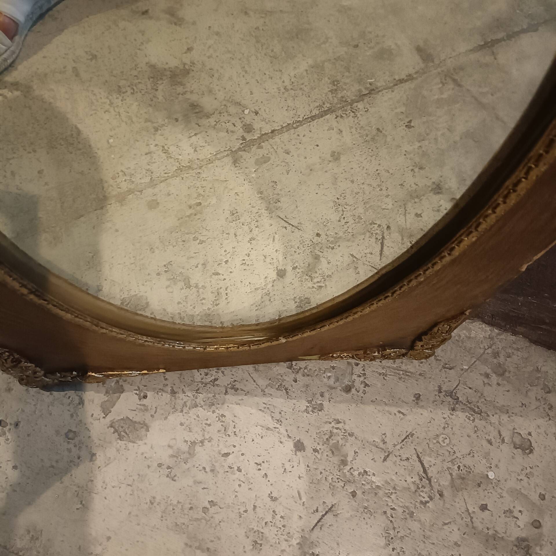 Oval and gold Art Deco mirror