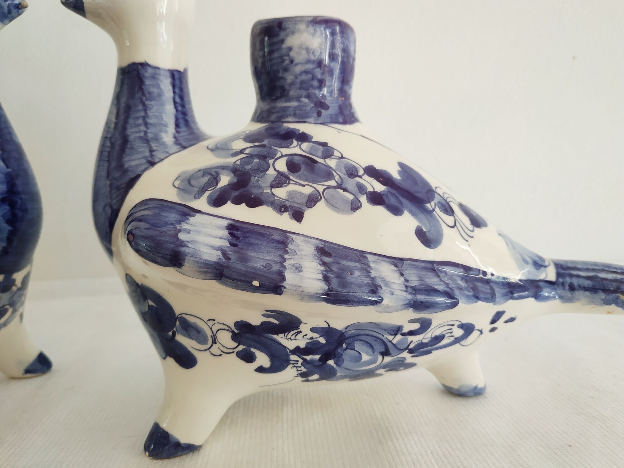 Pair of bird candlesticks in blue white, Skyros earthenware