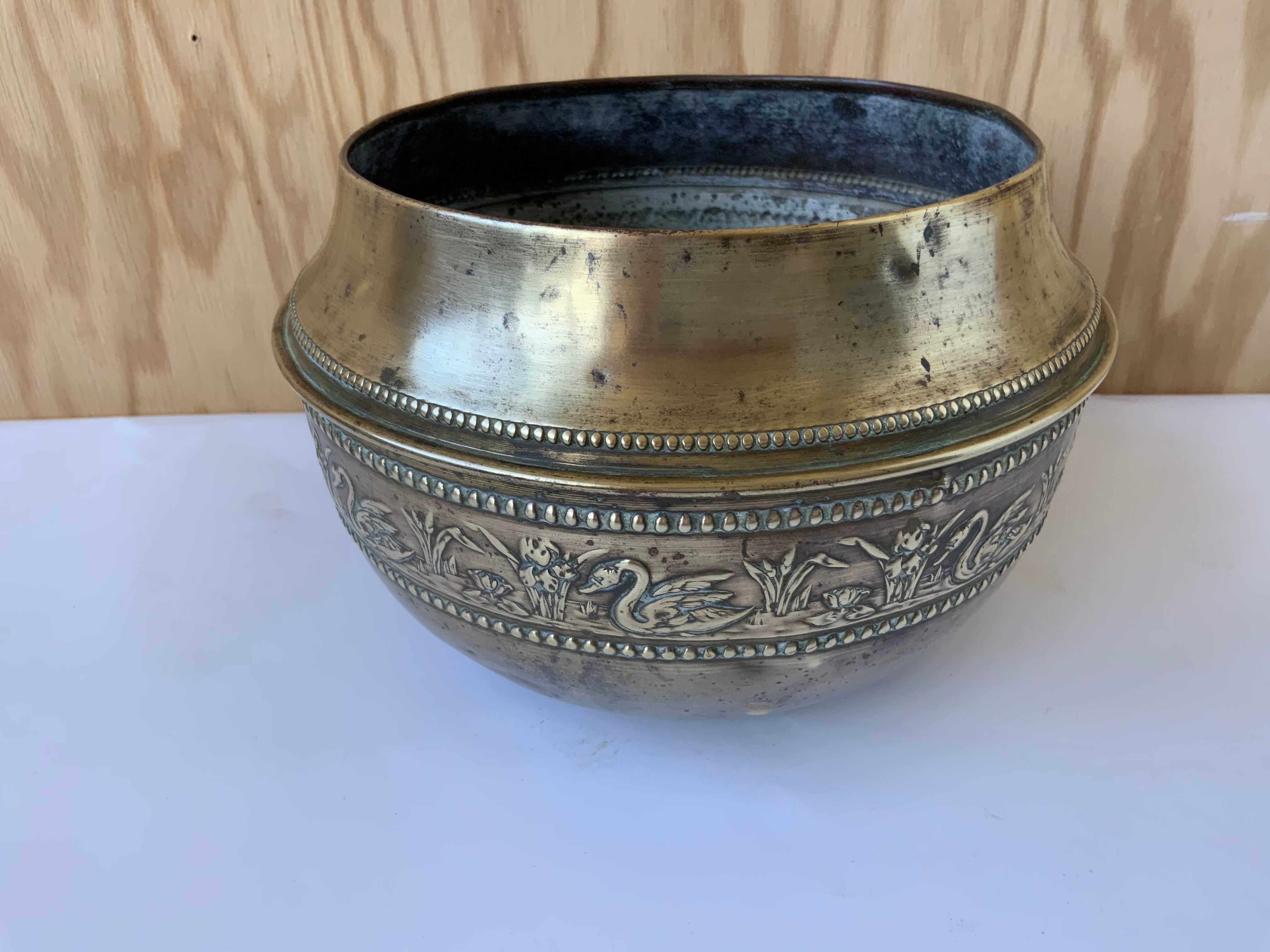 Brass pot cover
