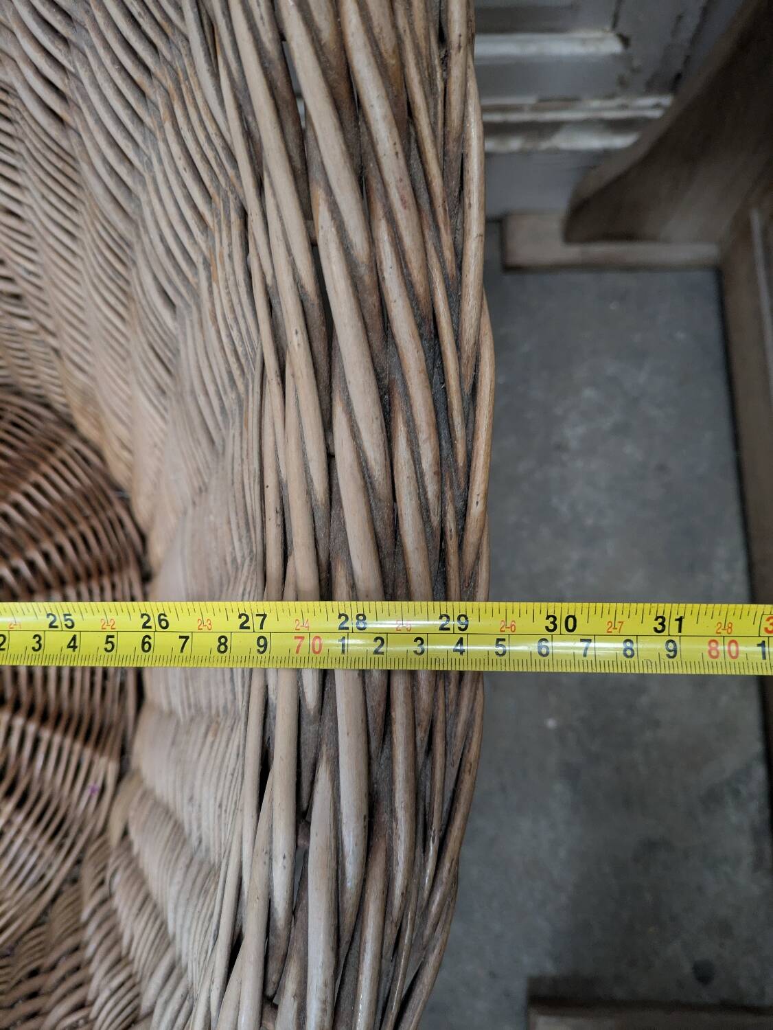 Large woven rattan armchair