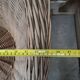 Large woven rattan armchair
