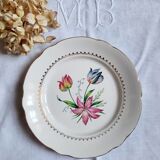 Flat antique earthenware plates with gilded edges