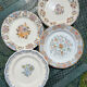 Composition of 4 flat earthenware plates, Gien