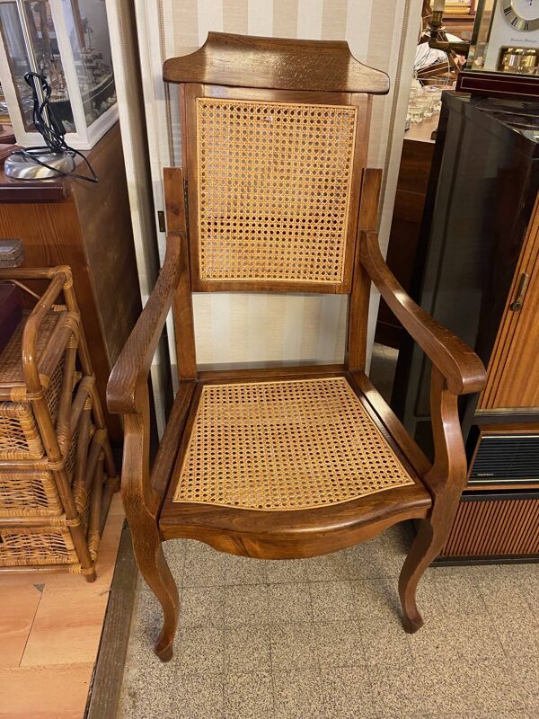Fauteuil de barbier style Louis Philippe en hêtre assise et dossier en cannage