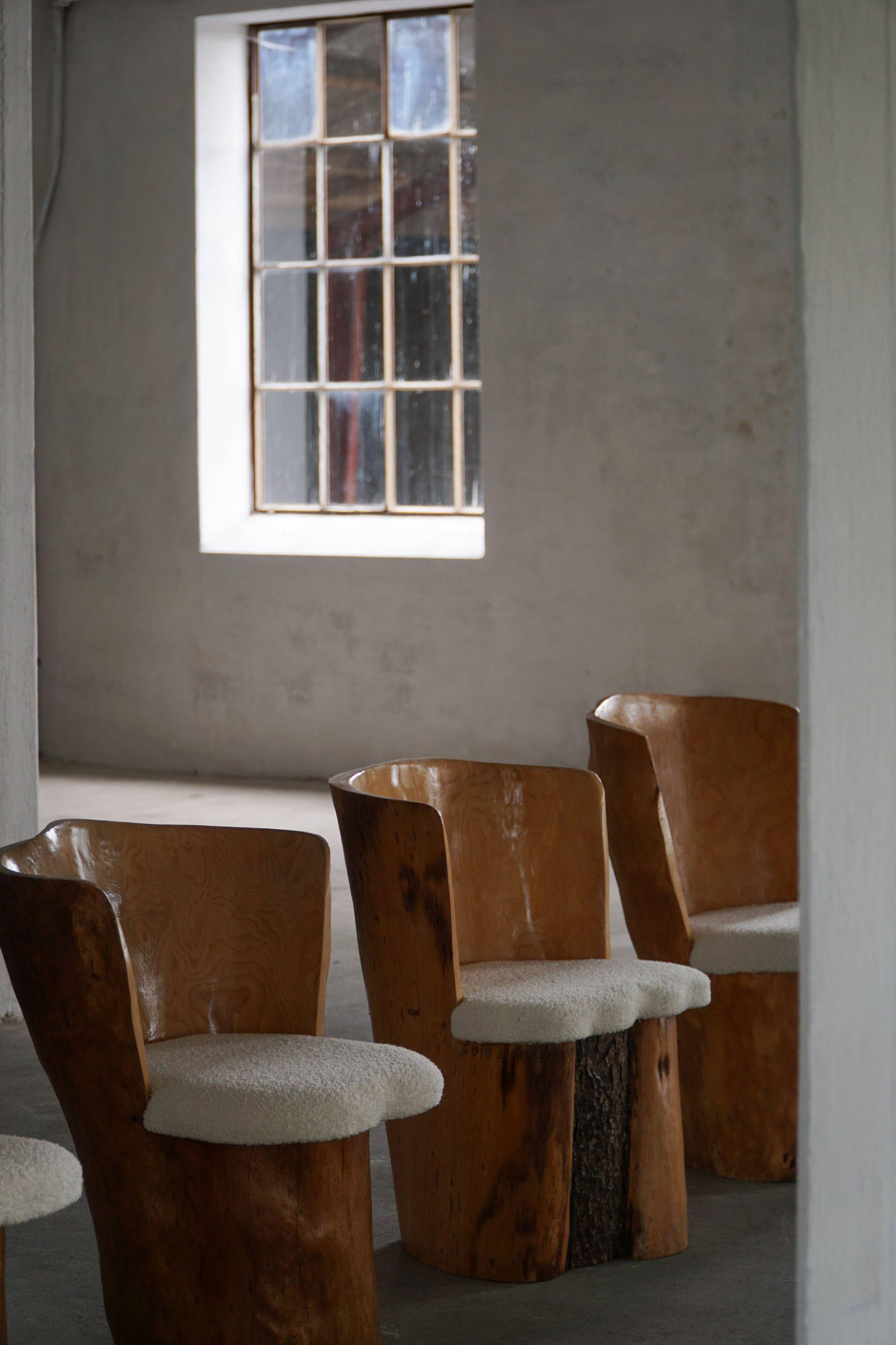 Swedish modernity, set of four stump chairs, solid Wood Wood with boucle seats, 1960s.