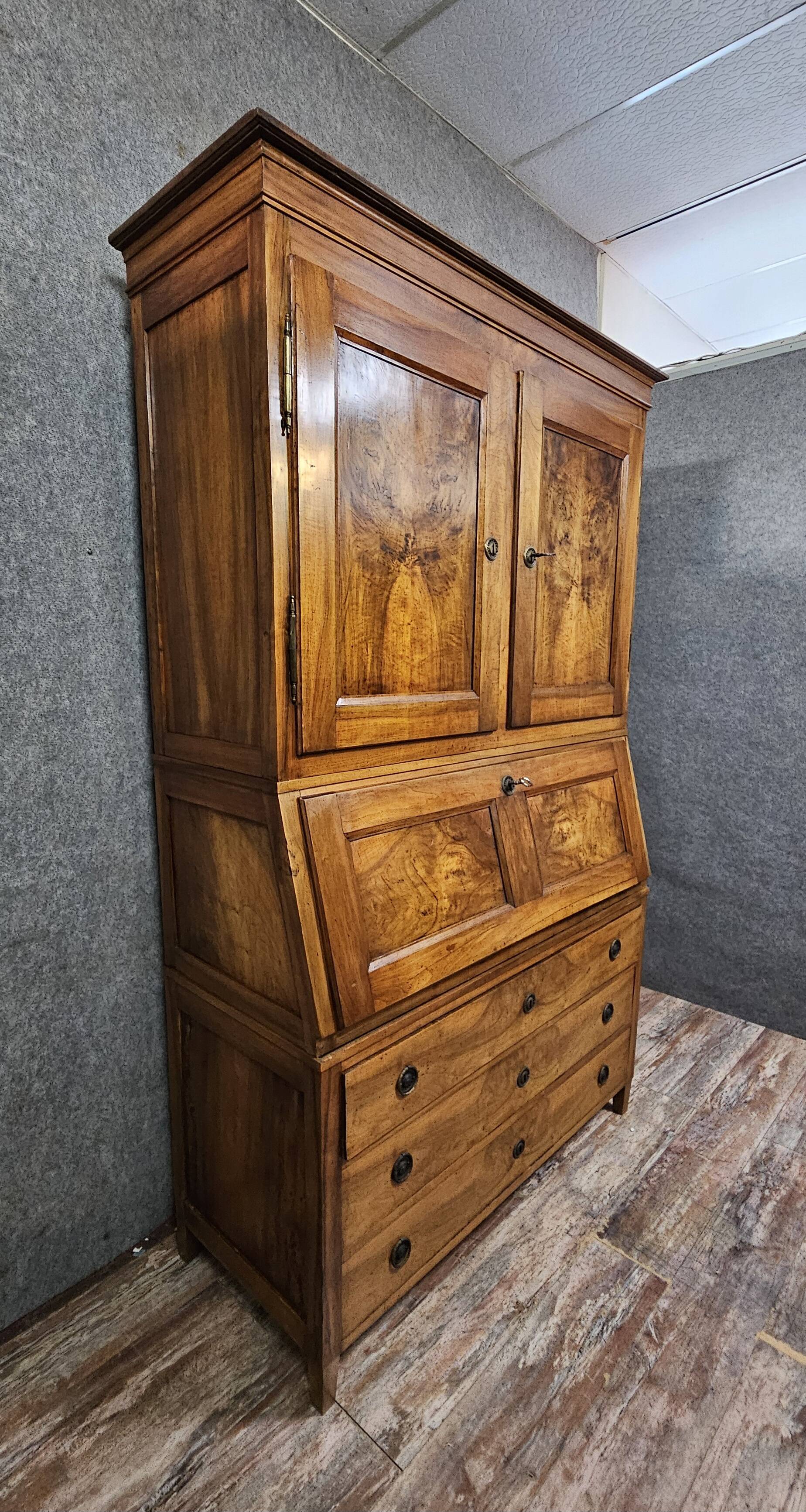 Secretary with three bodies in walnut from the Louis XVI period.