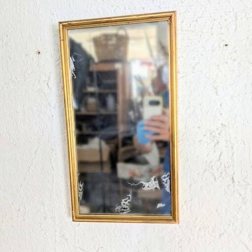 Miroir ancien doré à la feuille glace piquée