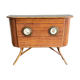 Rattan and wood bar with its decorative brass portholes