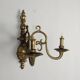Pair of antique wall sconces in 20th-century Baroque style.