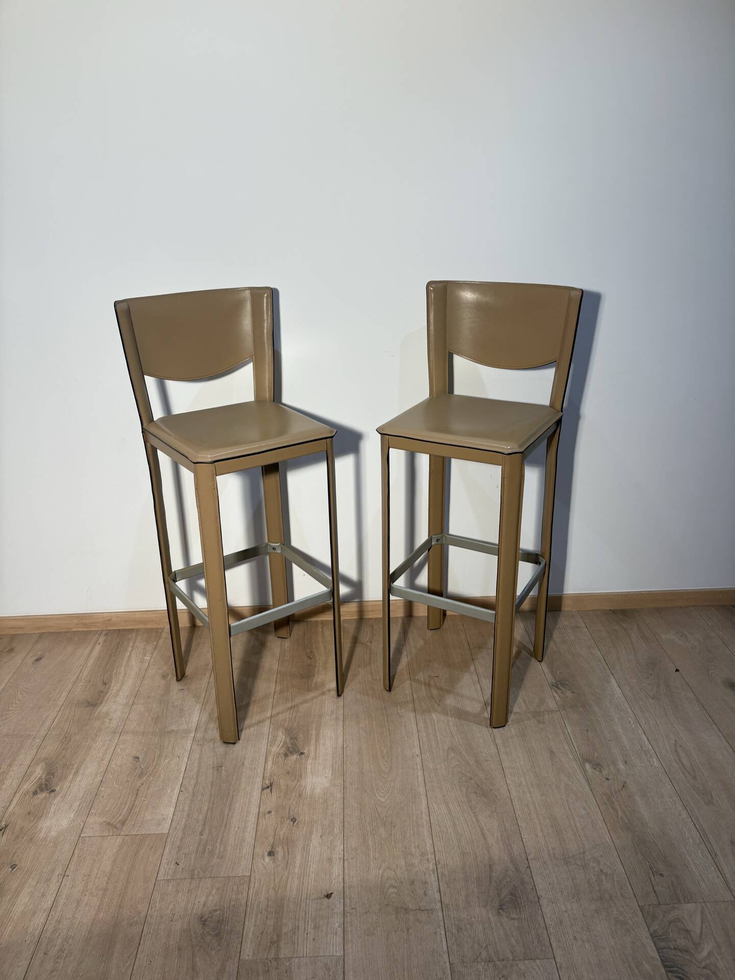 Pair of leather stools Enrico Pellizoni