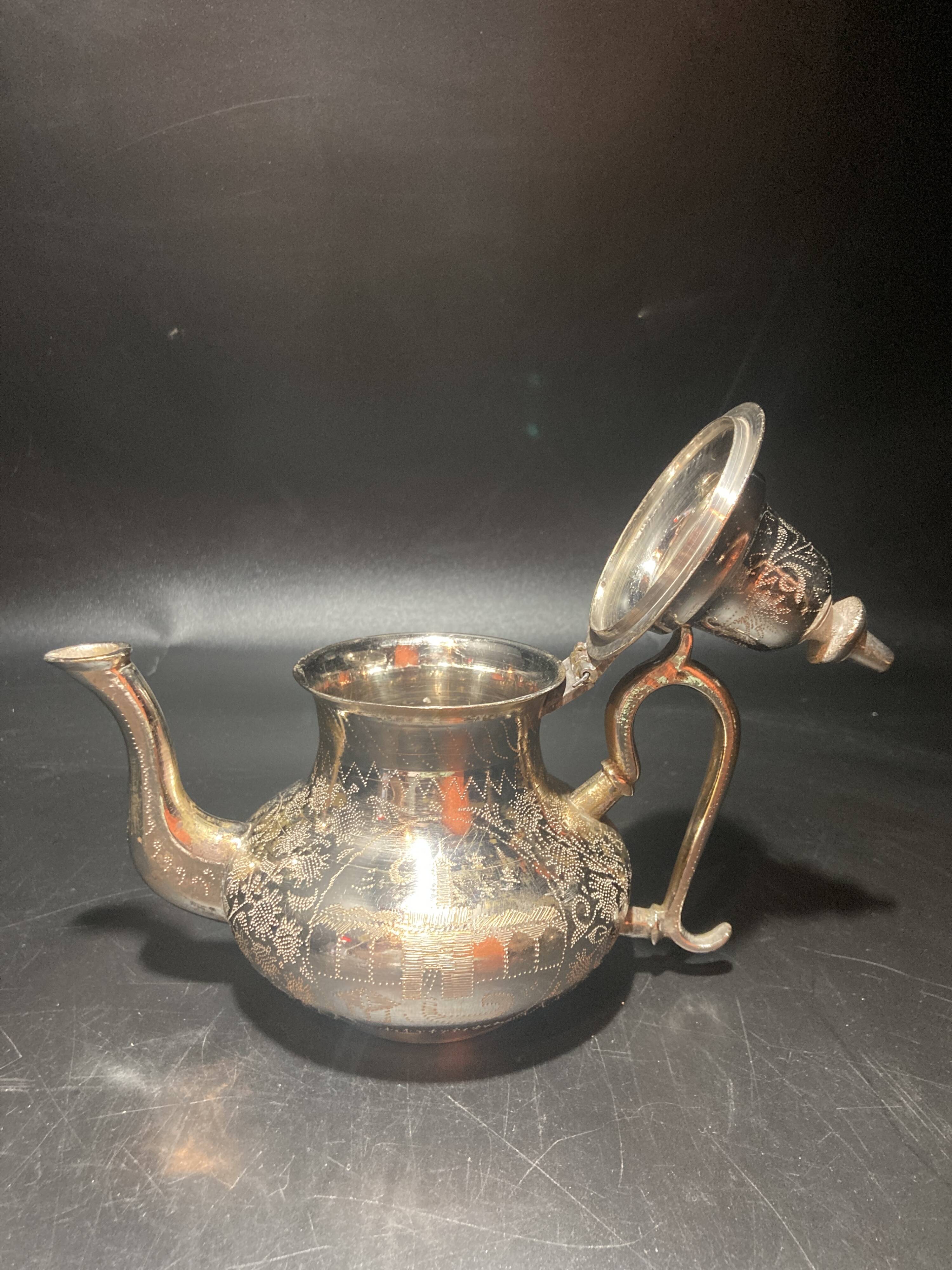 Silver metal teapot